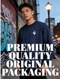 Person wearing a navy blue sweatshirt with a logo on a city street, text overlay 'PREMIUM QUALITY ORIGINAL PACKAGING'.